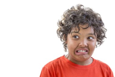 grimace of disgust. portrait of young boy grimacing of disgusty isolated on white background clipart