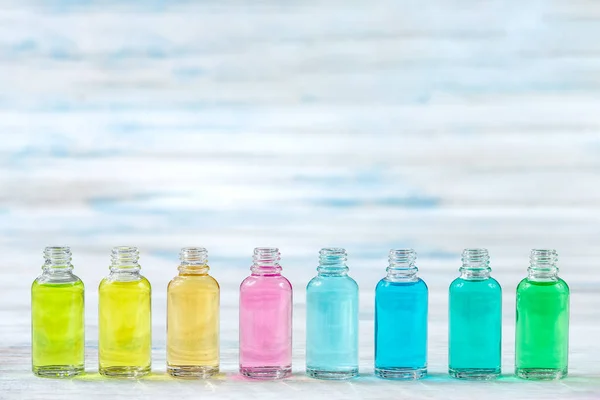 Line of Cosmetic color,bottles of essential oils Aromatherapy, alternative bodycare herbal composition — Stock Photo, Image