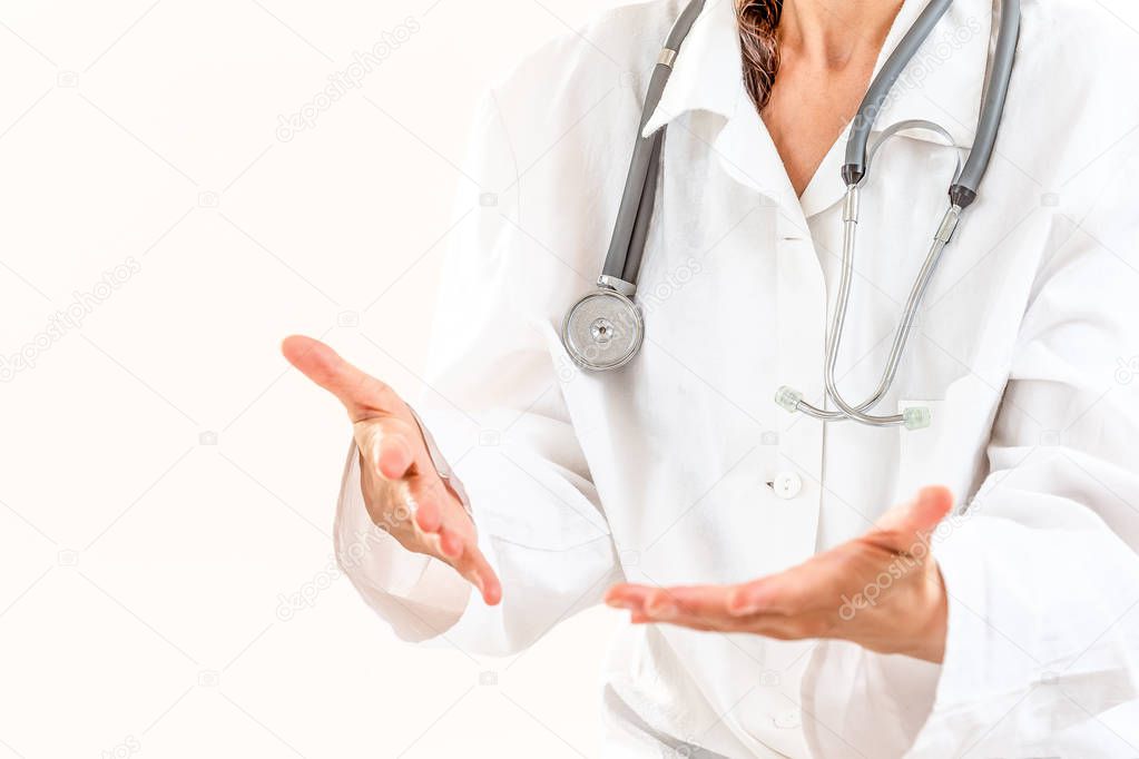 Female doctor explaining patient symptoms or asking a question as they discuss together in a consultation.