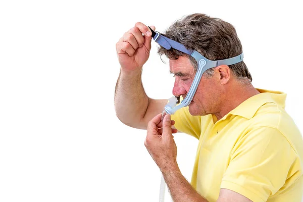 Man wearinhg a maslk Sleep Apnea and CPAP. Prescription, to sleep for safe life — Stock Photo, Image