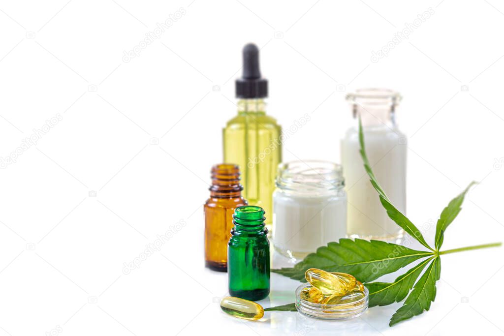 Cosmetic hemp concept Cannabis hemp bodycare procucts with marijuana leaf on whtebackground
