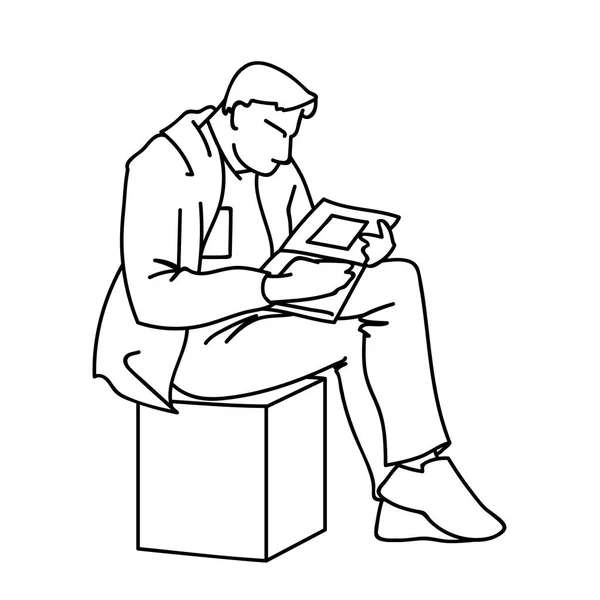 An adult man is reading a book sitting on a cube. Vector illustration of a man gazing intently into a magazine or journal with square art. Concept. Sketch. Linear art. Black lines on white background — Stock Vector