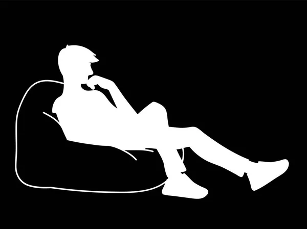 Frau sitzt auf großen Kissen. Schablone. Vektorillustration der weißen Silhouette isoliert auf schwarzem Hintergrund. Nachdenkliches Mädchen sitzend, ein Bein gebeugt, das andere gerade. Konzept. Monochromer Minimalismus. — Stockvektor