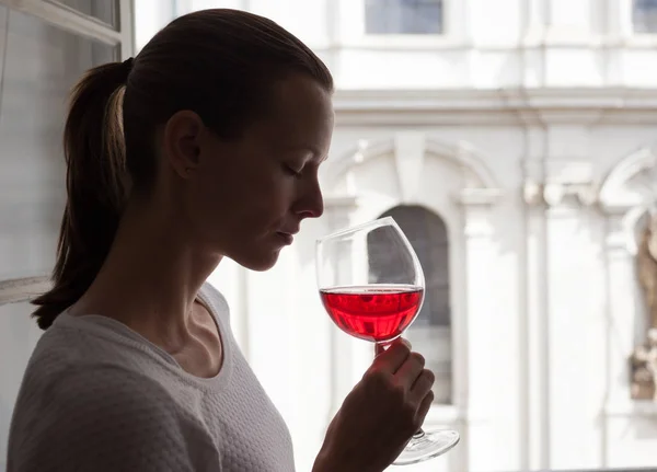 Wine tasting. Woman drinking wine.