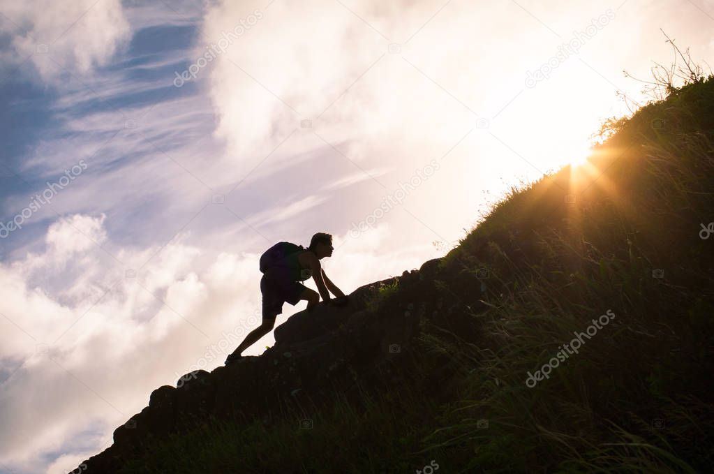 Man climbing on the mountain top