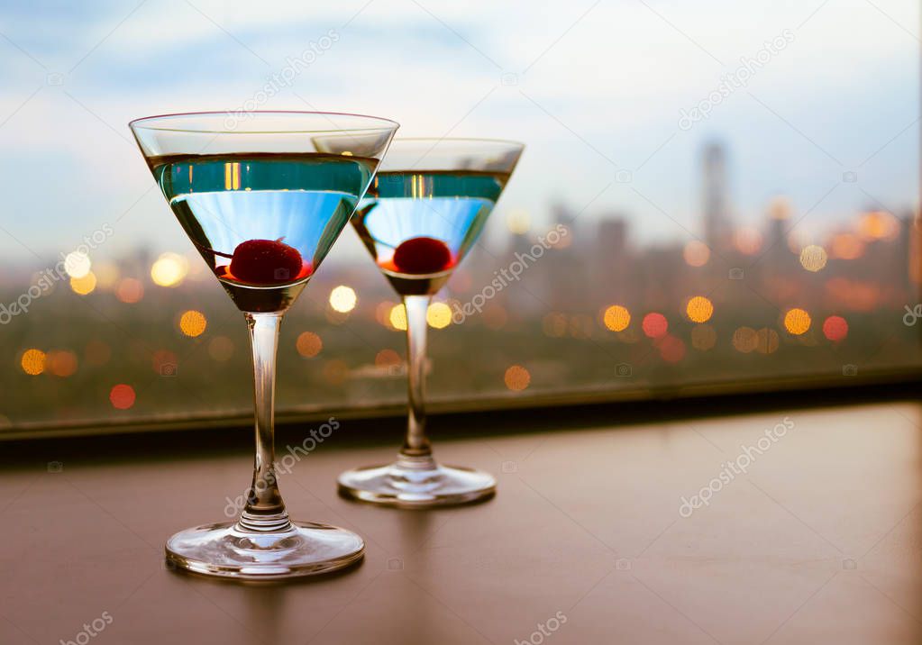 Martini drinks with city view. 