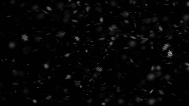 Biçimlendirilmiş kar tanelerinin aşağıya doğru yüzen bir bilgisayar animasyonu
