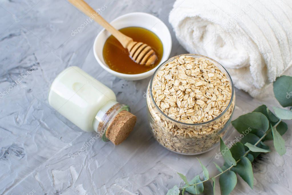 Natural Ingredients Homemade Body Oatmeal Sea Salt Scrub with Olive Oil Honey Milk White Towel Beauty Concept Skincare Organic Aroma Spa Therapy