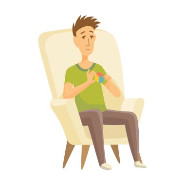 Ev tatili. Çocuk sandalyeye oturup Rubik Cube oynuyor. Gençler boş vakit geçirir. - Evde kalıyorum. Yalnız zaman geçirmenin tadını çıkardım.