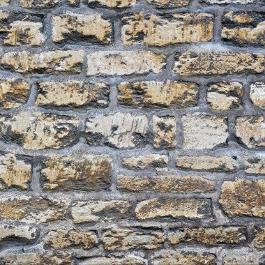 Yakın çekim ayrıntı yıpranmış bir taş duvar