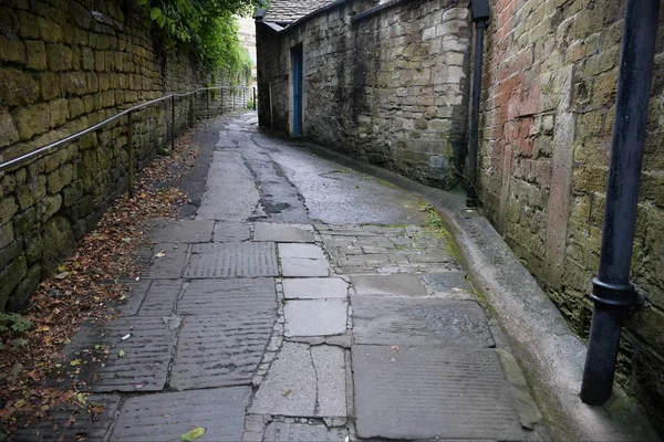 View of a Dark Alleyway Leading up a Hill