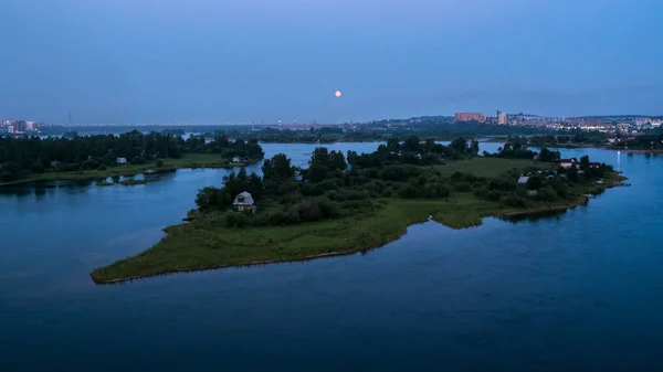 The Rise of the Full Moon over the Angara River in Irkutsk