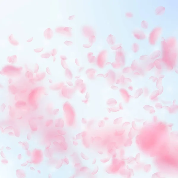 Sakura petals falling down. Romantic pink flowers gradient. Flying petals on blue sky square backgro — Stock Vector