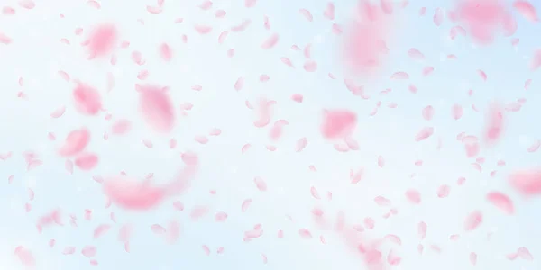Pétalos Sakura cayendo. Flores rosas románticas cayendo lluvia. Pétalos voladores en cielo azul respaldo ancho — Archivo Imágenes Vectoriales