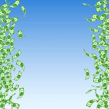 Amerikan dolarları düşüyor. Üzerinde küçük dolar banknotları 