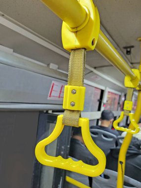 handrails and handles in the buses in India