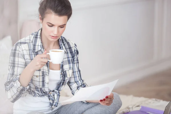 stock image Young attractive woman working home at the laptop