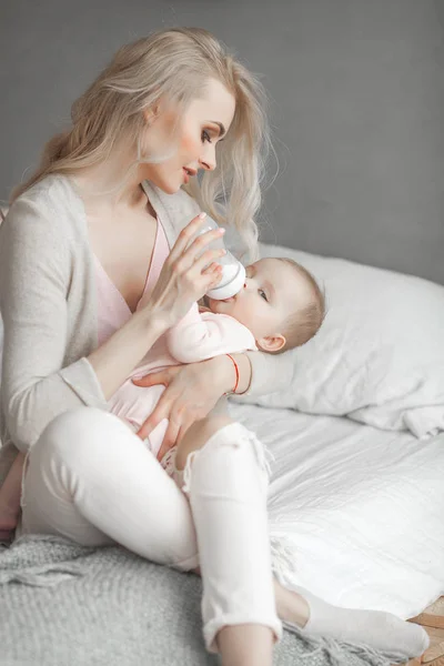 Young Mother Feeding Her Little Cute Baby Daughter Bottle Child — Stock Photo, Image