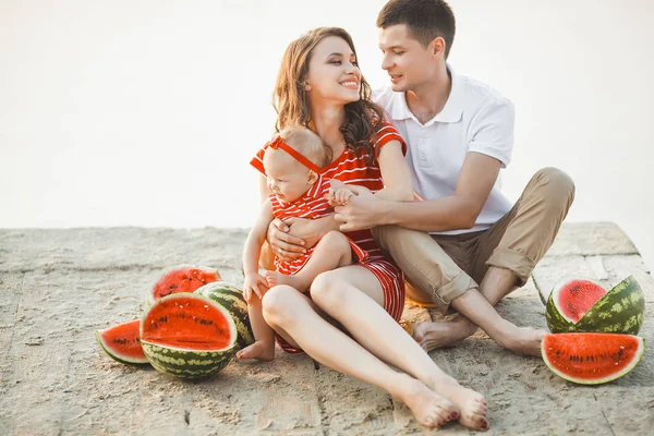 Happy Young Family Sitting Water Bridge Mom Dad Little Baby — Stock Photo, Image