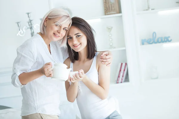 Two Women Talking Mother Daughter Indoors Together Ladies Drinking Tea — Stock Photo, Image