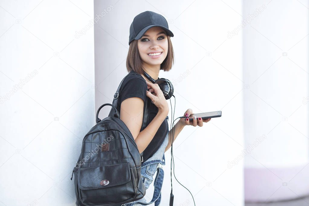 Attractive young woman outdoors riding a segway. Pretty female on scooter. Modern youth.