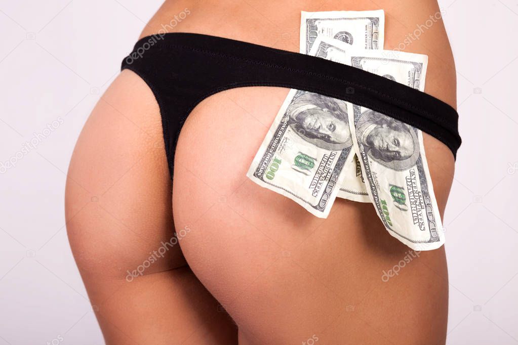 woman with money tucked into her underwear