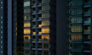 Modern apartment buildings on night. Facade of a modern apartment building 