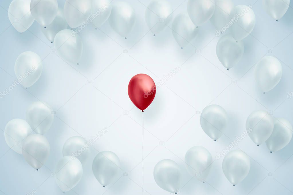 Red balloon standing out from crowd of white balloons. Leadership, independence, initiative, strategy, dissent, think different, uniqueness, business success concept