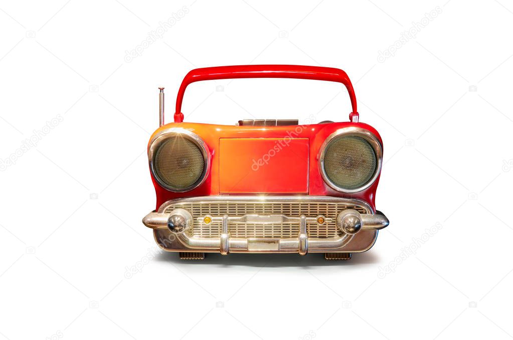 Old antique car shape AM FM stereo cassette player isolated on white background