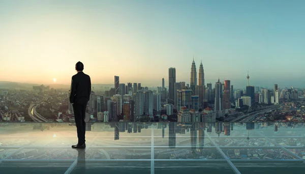 Businessman Standing Transparent Glass Floor Rooftop City Skyline Success Thinking — Stock Photo, Image