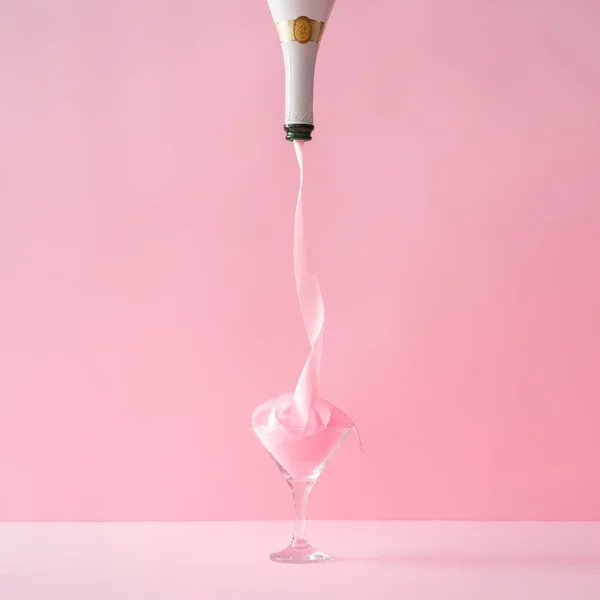 Pink Party Ribbon Pouring Champagne Bottle Glass Minimal Celebration Concept — Stock Photo, Image