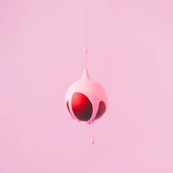 Red Cchristmas Bauble Decoration Dripping Pastel Pink Paint Minimal New — Stock Photo, Image