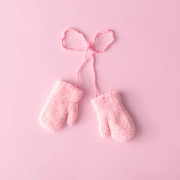 Pink wool gloves against pastel background. Minimal winter concept — Stock Image Pink Wool Gloves Pastel Background Minimal Winter Concept Stock Photo