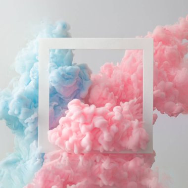 Çerçeve gri arka plan üzerinde soyut pastel pembe ve mavi bulutlar. 