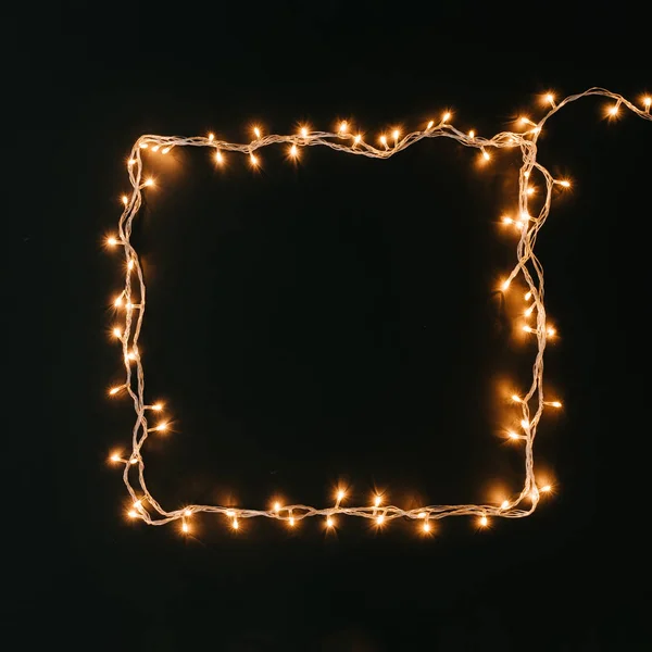 Quadratische Form Aus Weihnachtsbeleuchtung Dekoration Auf Dunklem Hintergrund Neujahr Flach — Stockfoto