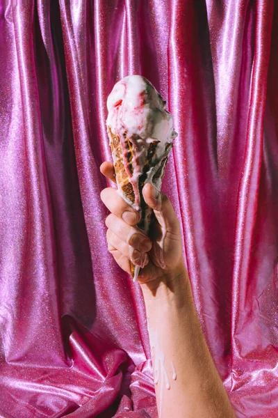 Vintage Style Concept Hand Holding Melted Ice Cream Pink Curtain — Stock Photo, Image