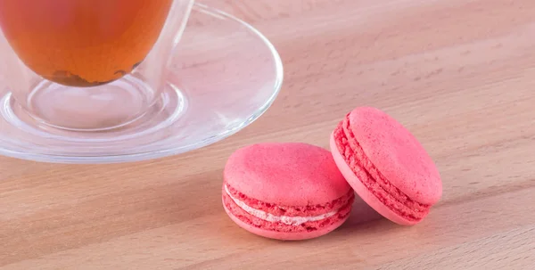 Light Wooden Table Cup Tea Saucer Pair Pink Macaroni Cookies — Stock Photo, Image