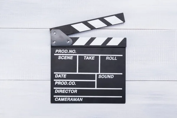 clapperboard for filming a film on a light background