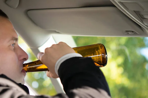 Close Man Uses Alcoholic Drink Beer Sitting Wheel Car — Stock Photo, Image