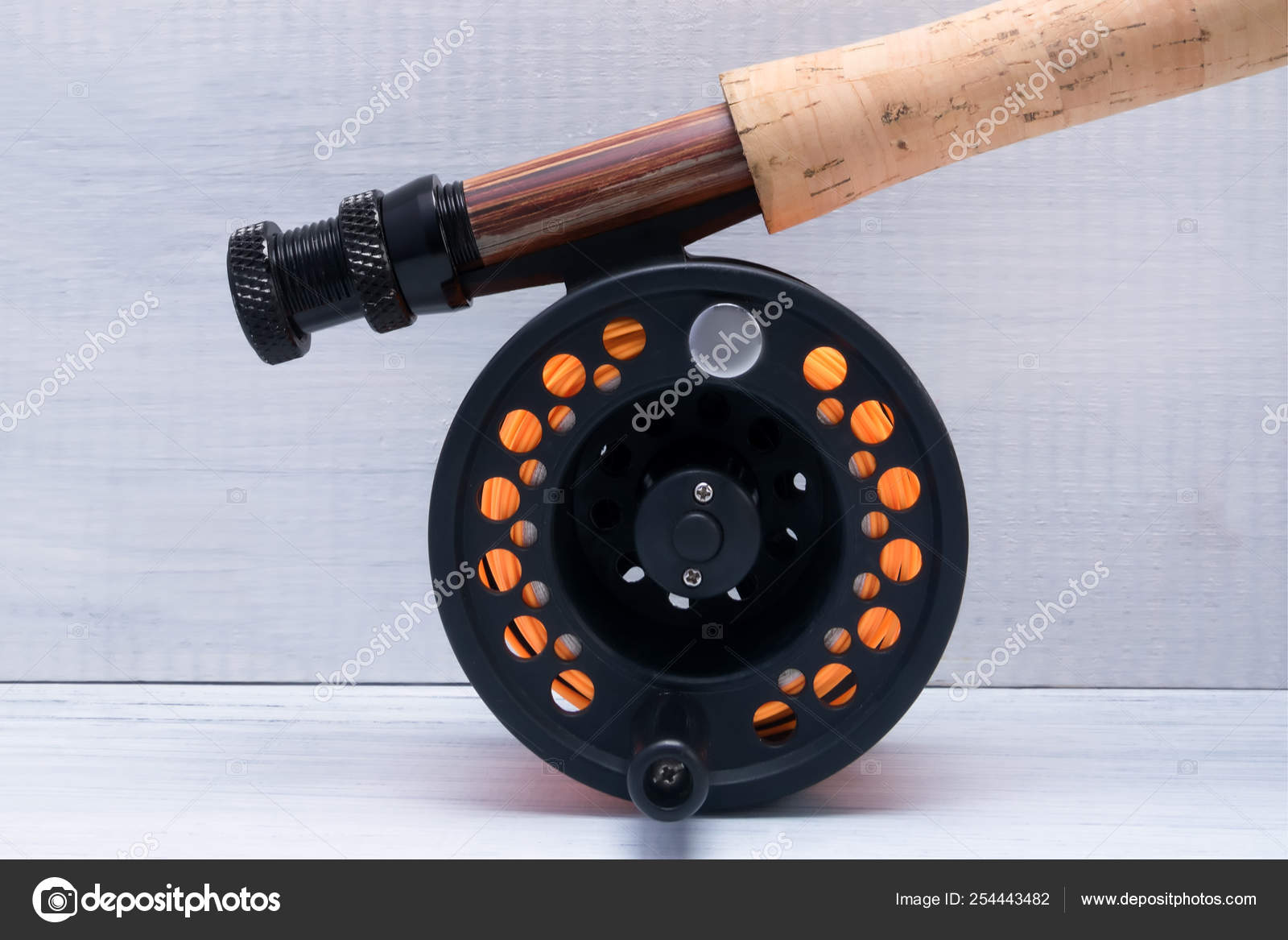 orange fishing rod and reel