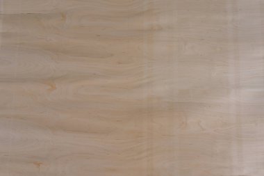 Açık ahşap bir yüzeye yakın çekim. Dokuda doğal tahıl, düğüm ve çatlaklar var. Arkaplan, tasarım veya materyal referansı için ideal.