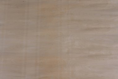 Açık ahşap bir yüzeye yakın çekim. Dokuda doğal tahıl, düğüm ve çatlaklar var. Arkaplan, tasarım veya materyal referansı için ideal.