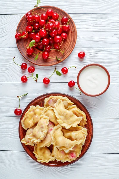 Delicious Cherry Dumplings Clay Plate Wooden Table Plate Fresh Cherries — Stock Photo, Image