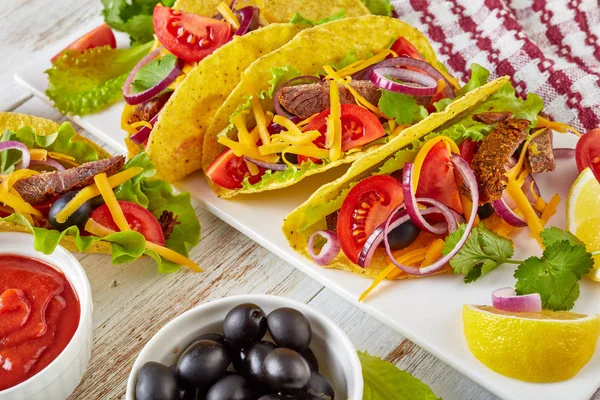 Tacos Roasted Beef Lettuce Red Onion Rings Tomato Olives Shredded — Stock Photo, Image