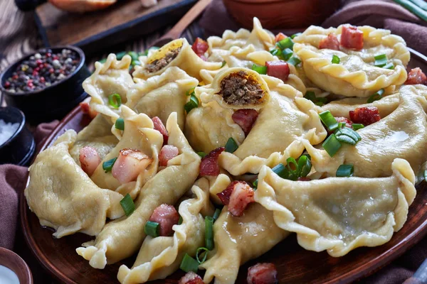 Hot pierogies or dumplings with ground liver — Stock Photo, Image