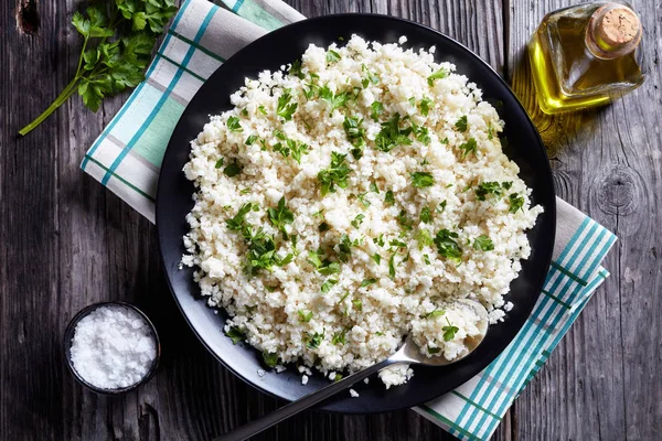 Cauliflower rice or couscous in a bowl — Stock Photo, Image