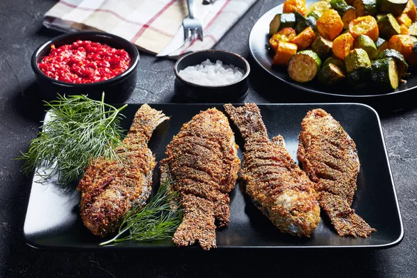 Freshly fried breaded crucian carps, top view — Stock Image Freshly fried breaded crucian carps, top view Stock Photo