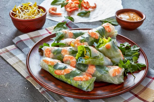 Asian spring rolls of rice paper with shrimps