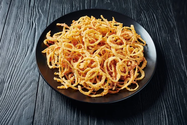 french crispy fried onions on a plate