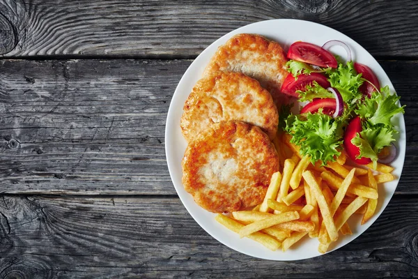 Delicious lunch, fried turkey burgers on a plate — Stok fotoğraf